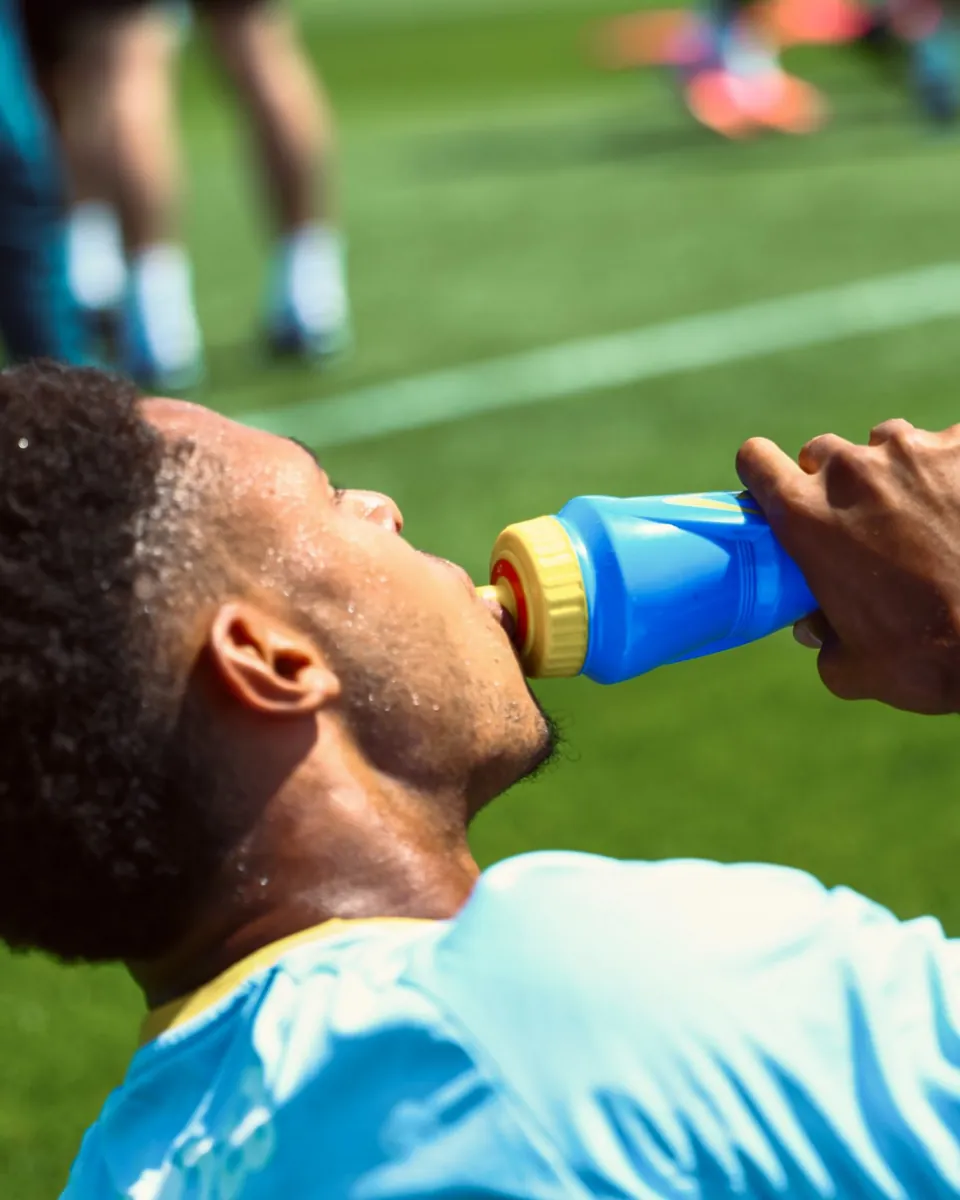 Kaye Furo drinking during training